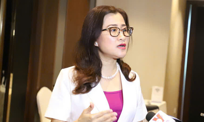 Bà Trần Thị Trang, Vụ trưởng Vụ BHYT (Bộ Y tế) chia sẻ tại hội thảo. Ảnh: N.Nhiên