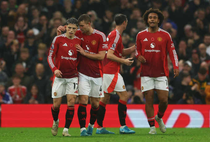 Garnacho không quá phấn khích sau khi ấn định chiến thắng 3-0 cho Man Utd. Ảnh: Reuters