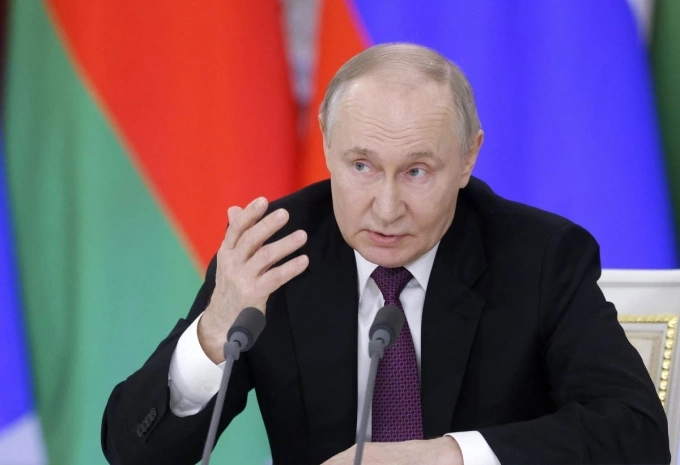 Tổng thống Nga Vladimir Putin họp báo ở Điện Kremlin ngày 13/3. Ảnh: AFP